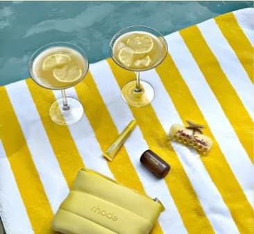 Margaritas styled on a yellow striped towel